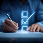 Businessman completing online survey form with checkbox icon using a pen, on a dark background Businessman completing online survey form with checkbox icon using a pen, on a dark background